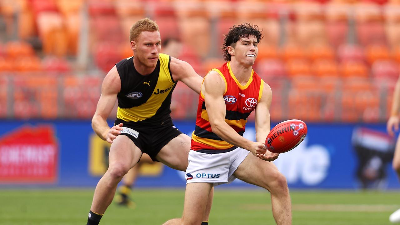 The Crows’ Ned McHenry gets the ball away against Richmond. Picture: Mark Kolbe/AFL Photos/via Getty Images