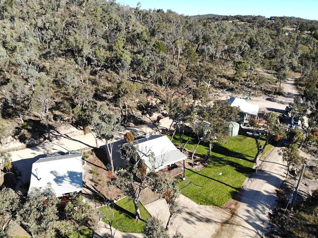 Glen Lough Cabins nestled on the edge of Girraween National Park has hit the market at $2.5m. Photo: Supplied