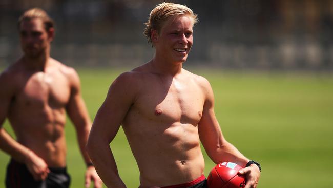 Isaac Heeney takes a break from the heat yesterday. Picture: Phil Hillyard