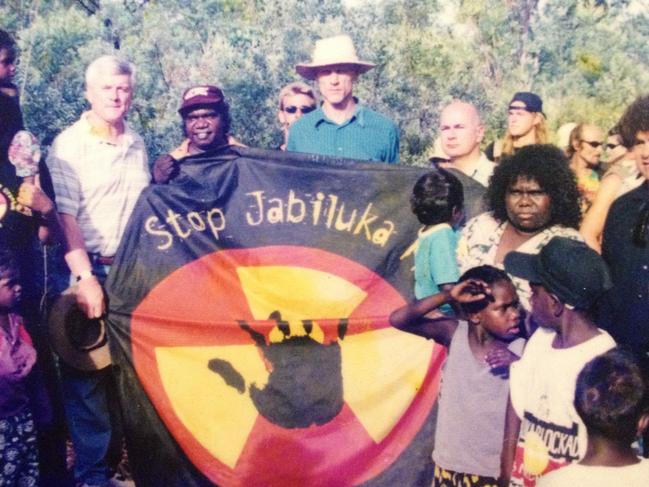 In 1998 more than 5000 people including Peter Garrett joined with Mirarr Traditional Owners to block the Jabiluka mine, owned by Energy Resources of Australia.