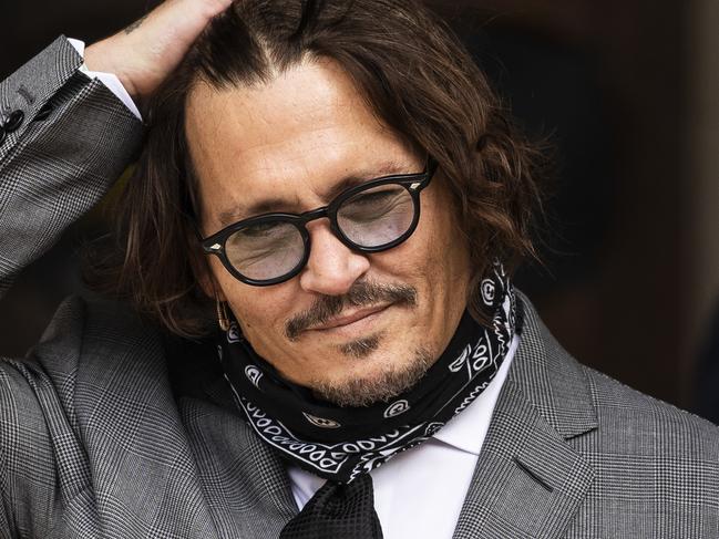 FILE PHOTO: Johnny Depp loses his libel case against the Sun newspaper LONDON, ENGLAND - JULY 13: Actor Johnny Depp arrives at the Royal Courts of Justice, Strand on July 13, 2020 in London, England. American actor Johnny Depp is taking News Group Newspapers, publishers of The Sun, to court over allegations that he was violent towards his ex-wife, Amber Heard, 34. (Photo by Dan Kitwood/Getty Images)