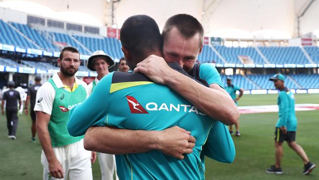 Test debutant Marnus Labuschagne congratulates Usman Khawaja after his match-saving knock. Picture: Getty