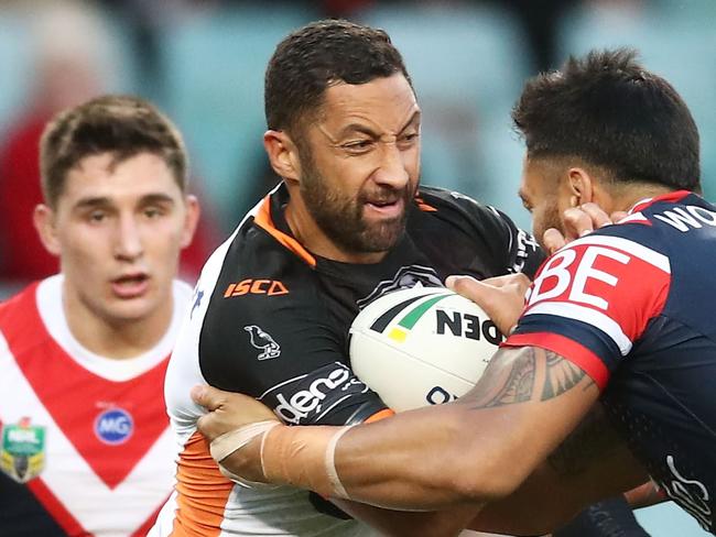 SYDNEY, AUSTRALIA - JUNE 03:  Benji Marshall of the Tigers is tackled during the round 13 NRL match between the Sydney Roosters and the Wests Tigers at Allianz Stadium on June 3, 2018 in Sydney, Australia.  (Photo by Matt King/Getty Images)