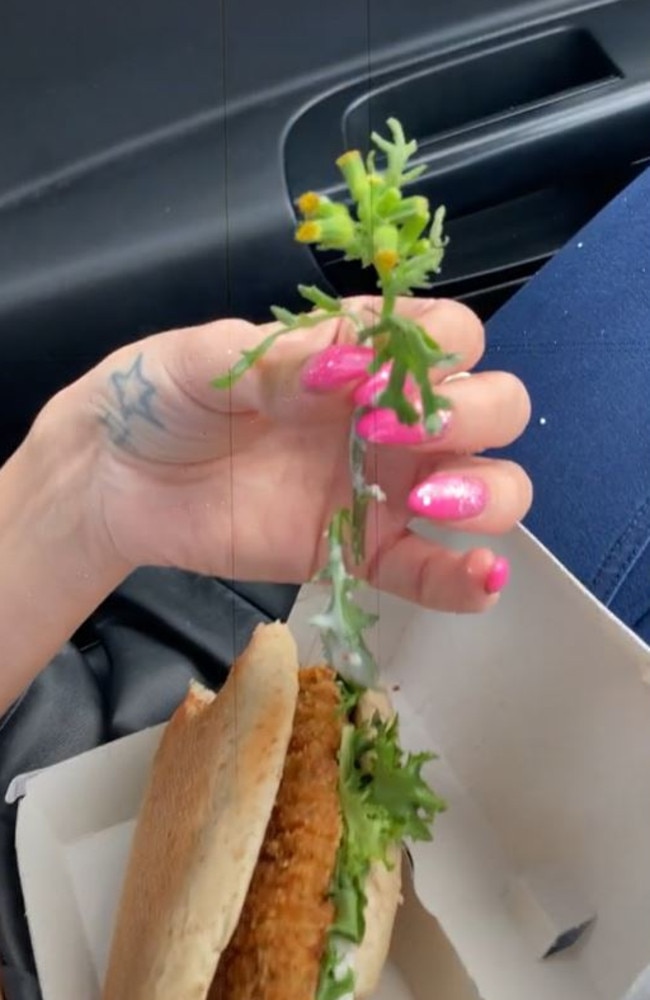 A woman has claimed she found a ‘flower’ in her McDonald's burger. Picture: TikTok/@wright1240