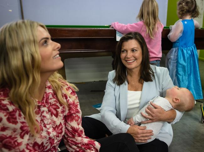 Molan and Jenny Morrison with baby Herbert Robertson, son of Sebastian Robertson who is the founder of Batyr, a mental health organisation in Parramatta. Picture: Jason Edwards