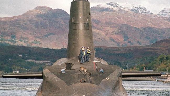 Sailors aboard the HMS Vanguard nuclear submarine, in Holy Loch, Scotland.