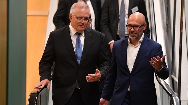 Prime Minister Scott Morrison (left) and President of the Business Council Tim Reed arrive at the Business Council of Australia. Picture: AAP