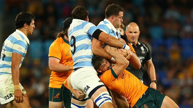 Jake Gordon of the Wallabies wrestles the ball during The Rugby Championship match between the Argentina and Australian Wallabies at Cbus Super Stadium on Saturday. (Photo by Jono Searle/Getty Images)