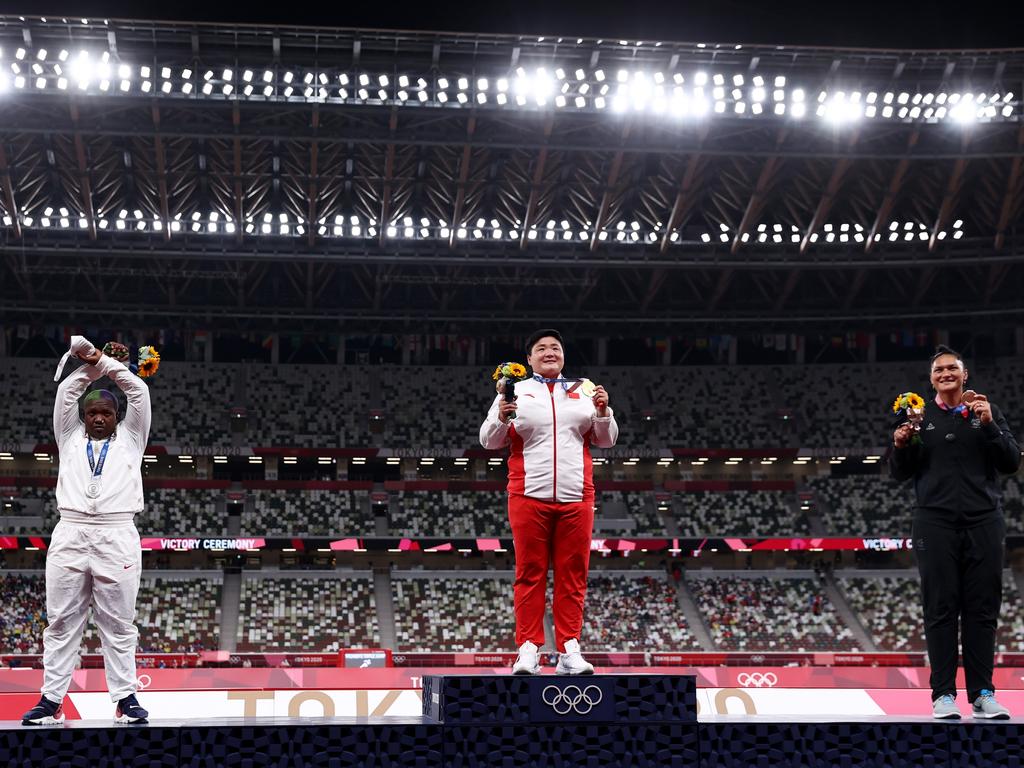 Raven Saunders made an ‘X’ gesture on the podium alongside China’s Lijiao Gong and New Zealand’s Valerie Adams. Picture: Ryan Pierse/Getty Images