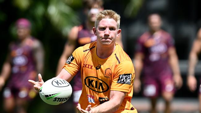 BRISBANE, AUSTRALIA - FEBRUARY 04: Tom Dearden passes the ball during a Brisbane Broncos NRL training session at the Clive Berghofer Centre on February 04, 2021 in Brisbane, Australia. (Photo by Bradley Kanaris/Getty Images)