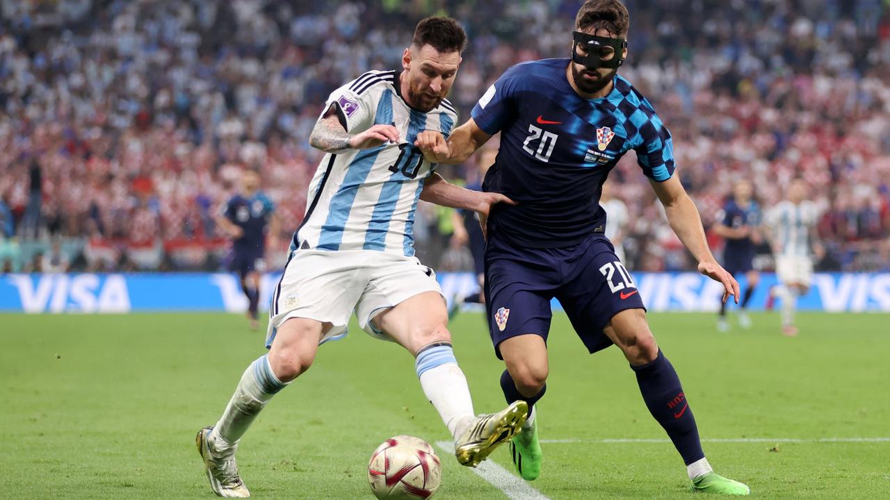 Josko Gvardiol (R) had an immense tournament, before Lionel Messi of Argentina gave him nightmares in the semi-final.