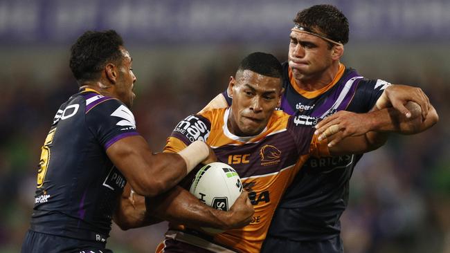 Jamayne Isaako tries to break through the Storm defence. Picture: AAP Image/Daniel Pockett