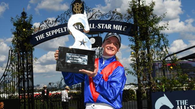 Jamie Kah poses with the All-Star Mile trophy after riding Zaaki to victory last Saturday. Picture: Racing Photos via Getty Images