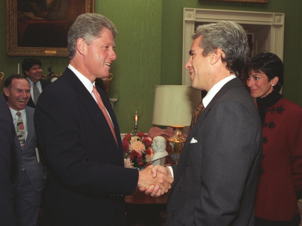 Ghislaine Maxwell watches as Jeffrey Epstein and US President Bill Clinton shake hands.