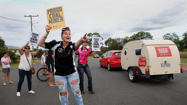 Locals and pro-Adani supporters spill on to the street to protest against anti-Adani environment activists as they arrive by convoy on April 27, 2019 in Clermont. Picture: Lisa Maree Williams/Getty Images