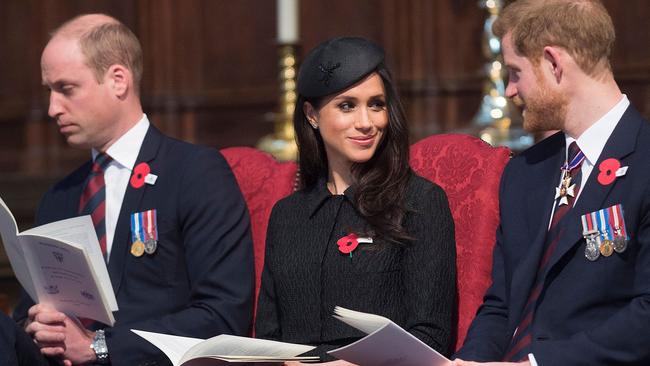 Prince William looked exhausted as he sat alongside Meghan Markle and his brother. Picture: AFP Photo/Pool/Eddie Mulholland