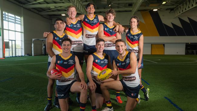 Adelaide’s 2018 AFL draftees and recruits at the training facility in West Lakes. Left to right; Back: Tyson Stengle, Kieran Strachan, Shane McAdam, Jordan Butts, Will Hamill; Front: Chayce Jones, Ned McHenry, Lachlan Sholl. Picture: Alex Aleshin