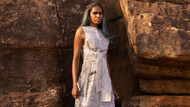 Velda Nabulwad models a dress made from Injalak fabric printed in Gunbalanya. The dress was featured at Melbourne Fashion Week. Picture: Contributed