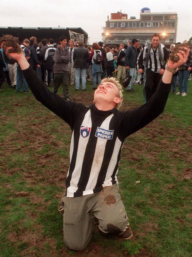 A fan with clumps of turf on the historic day.