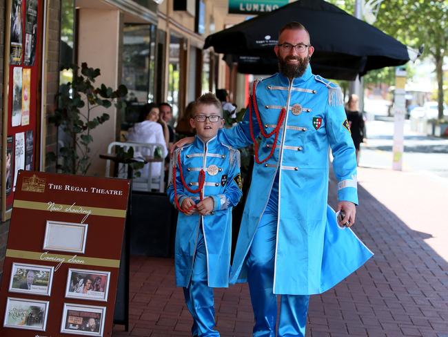 Harrison, with his father Matt, dons his Sergeant Pepper attire to meet his hero Paul McCartney.