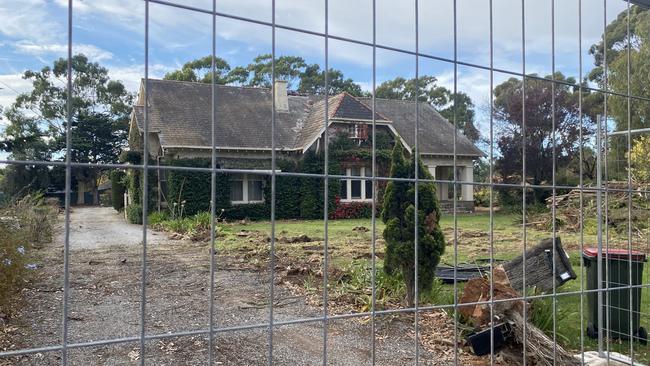 The property as it looks now – surrounded by felled trees and fencing. Picture: Patrick James