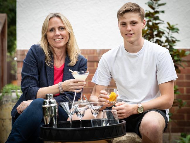 Julie Cross and son Charlie, 18, show how you can still have fun during isolation. (AAP Image / Julian Andrews).