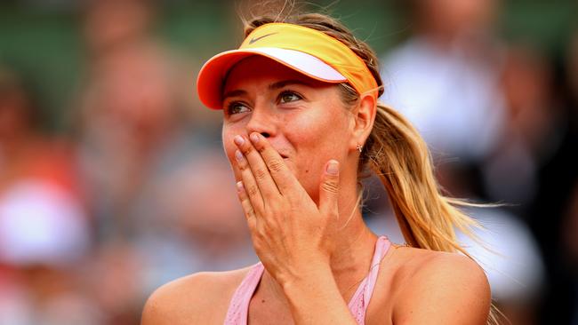 PARIS, FRANCE - JUNE 03: Maria Sharapova of Russia celebrates victory during her women's singles match against Garbine Muguruza of Spain on day ten of the French Open at Roland Garros on June 3, 2014 in Paris, France. (Photo by Clive Brunskill/Getty Images)