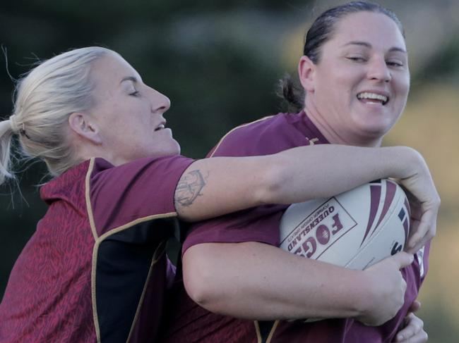 ROYAL PINES- BENOWA- JULY18Women of League Steph Hancock is tackled by Ali Brigginshaw during training at Royal Pines on the Gold Coast. PHOTO- AAP/TIM MARSDEN