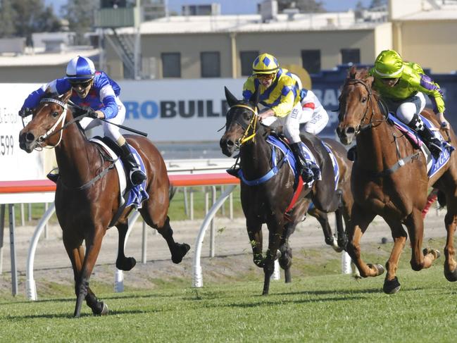 Melinda Graham riding the Darren Graham-trained Masked Model to victory in the QBI Neuroscience Fillies and Mares Maiden Handicap (1200m) at the Gold Coast. Photo: JESSICA HAWKINS/TRACKSIDE PHOTOGRAPHY