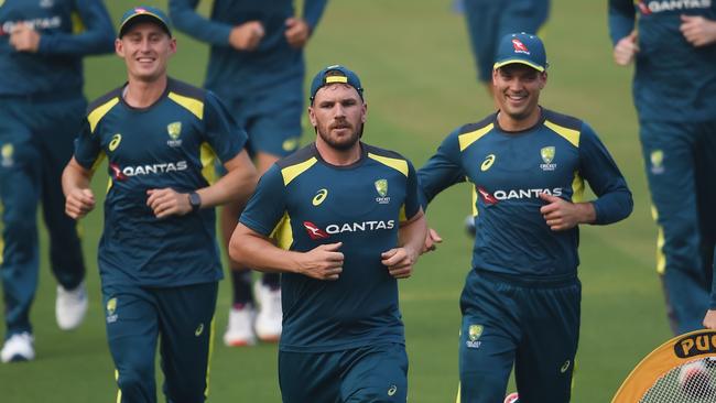 Marnus Labuschagne, Aaron Finch and Alex Carey hit the ground running in Mumbai. Picture: AFP