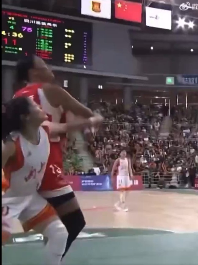 Liz Cambage winds up with a cocked elbow.