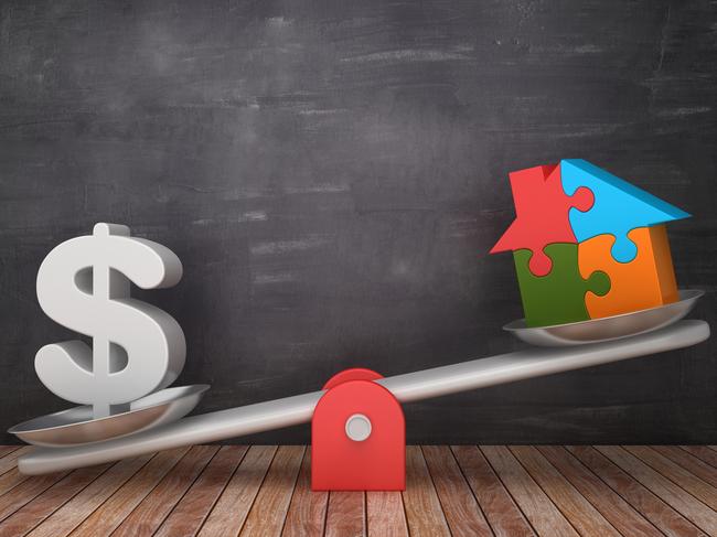 Seesaw Scale with Dollar Sign and Puzzle House on Chalkboard Background - 3D Rendering; housing wealth balance generic