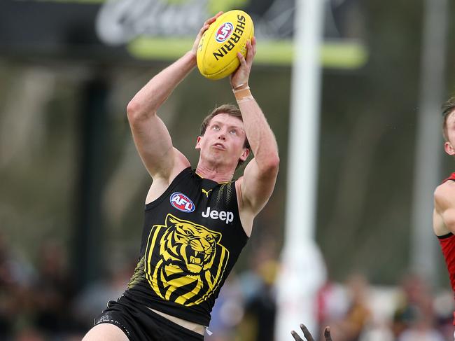 JLT Community Series. Round 1. Essendon v Richmond in Wangaratta. Richmond's Dylan Grimes takes a mark in defence 3rd qtr  . Pic: Michael Klein