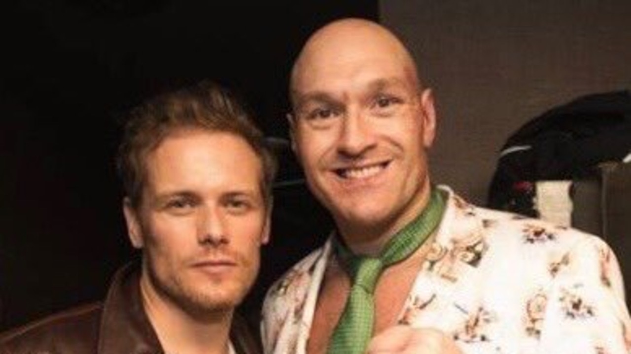 Outlander actor Sam Heughan next to Tyson Fury.