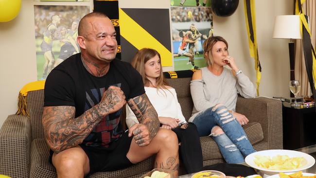 Dustin Martin's father Shane watches the count with his stepdaughter Emma, 17, and wife, Adriana. Picture: Alex Coppel