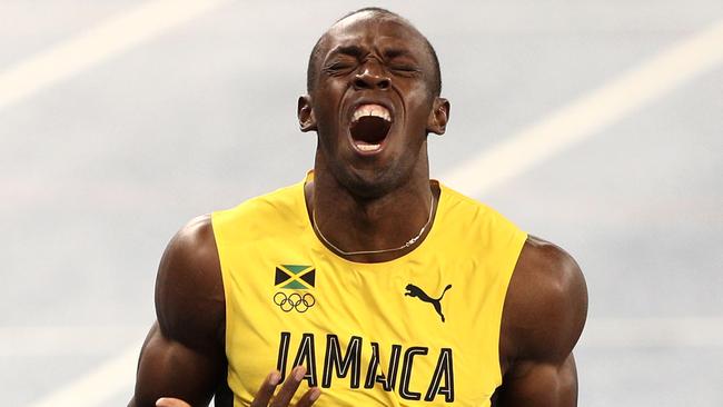 RIO DE JANEIRO, BRAZIL - AUGUST 18: Usain Bolt of Jamaica celebrates winning the MenÂ’s 200m Final on Day 13 of the Rio 2016 Olympic Games at the Olympic Stadium on August 18, 2016 in Rio de Janeiro, Brazil. (Photo by Paul Gilham/Getty Images)