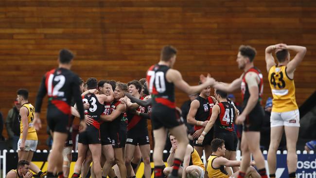 Essendon’s VFL side celebrate their nailbiting win. Picture: Getty Images.