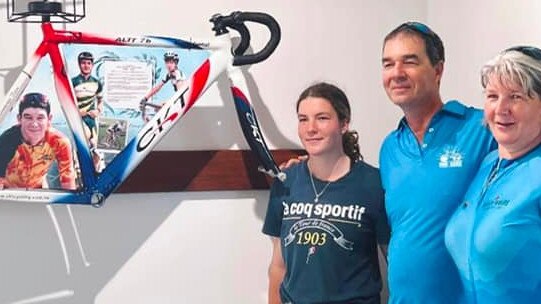 Luke Azzopardi's sister Jasmine with mum and dad Ian and Sue at the Cairns Cycling Club which unveiled a sculpture for its former rider.