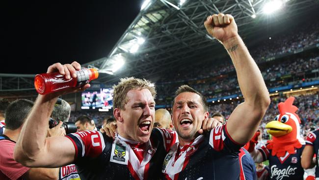 Aubusson and Mitchell Pearce celebrate winning the 2013 decider. Picture: Gregg Porteous