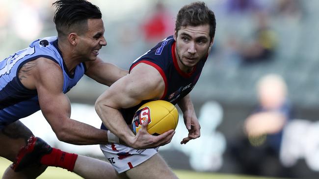 SANFL - ELIMINATION FINAL - Sturt v Norwood at Adelaide Oval. Edward Smart under pressure from Danyle Pearce Picture SARAH REED