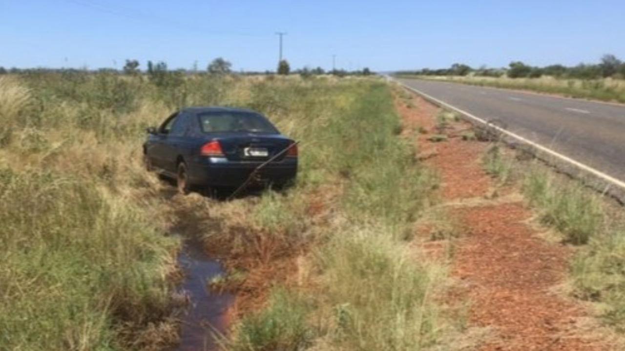 The bogged blue Ford Falcon. Picture: NT Courts/ NT Police