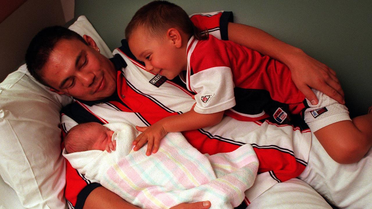 Kostya Tszyu with son Tim after the birth of his second son Nikita.