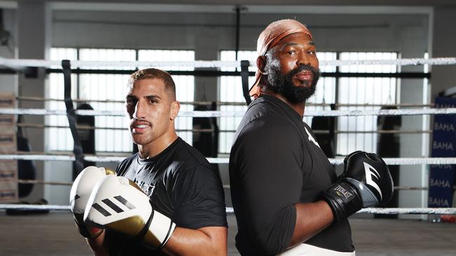 Julius Long (R) has been brought in to spar with Australian heavyweight Justis Huni. And he has quite the story to tell Picture: Liam Kidston