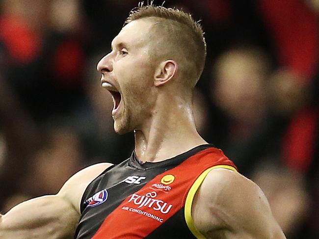 AFL Round 15. 01/07/2018.   Essendon v North Melbourne at Etihad Stadium.  Essendon's Shaun McKernan celebrates as the final siren sounds  . Pic: Michael Klein