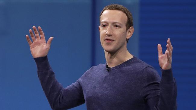 Facebook CEO Mark Zuckerberg is under fire for not banning posts that promote conspiracy theories. Pic: AP