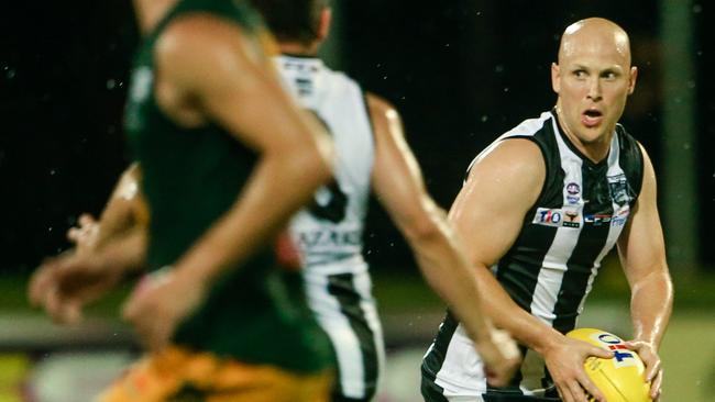 Gary Ablett Jr with ball in hand for Palmerston against St Mary’s. Picture: Glenn Campbell