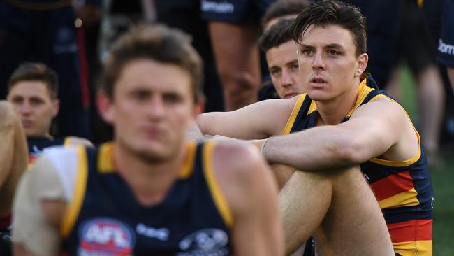 Matt Crouch (foreground, blurred) won the Crows’ best and fairest, and Jake Lever couldn’t make the top 10. Picture: AAP