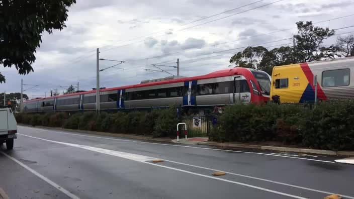 A train is shunted through the Brighton Rd intersection at Hove