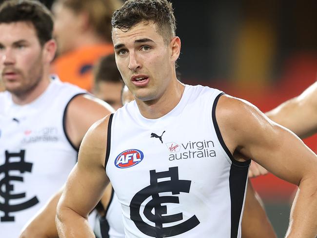 GOLD COAST, AUSTRALIA - SEPTEMBER 03: The Blues look dejected after losing the round 15 AFL match between the Greater Western Sydney Giants and the Carlton Blues at Metricon Stadium on September 03, 2020 in Gold Coast, Australia. (Photo by Chris Hyde/Getty Images)