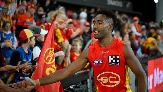 Gold Coast’s Hewago Paul Oea enjoys a win with fans last year. Picture: Matt Roberts/AFL Photos/via Getty Images